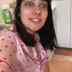 A very cute girl shits into a toilet from an under ass view. A nice log hangs and drops, then we see the product in the bowl. Filmed from a between the legs perspective. Vertical format video. Under a minute.